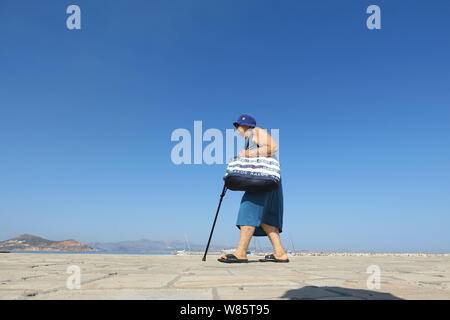 Greece:  From Athens to the islands amazing scenery, people and history. An old lady on Naxos Island. Stock Photo