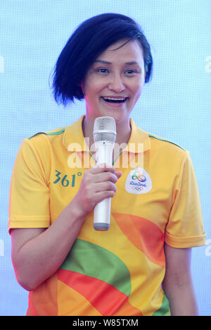 Former Chinese diver Gao Min, who won gold medals in the springboard event of the 1988 and 1992 Olympic Games, attends a signing event in Wuhan city, Stock Photo