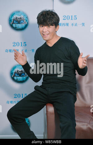 --FILE--Chinese actor Wang Baoqiang poses during an interview to promote his movie 'Impossible' in Beijing, China, 28 November 2015.   Dropping a bomb Stock Photo