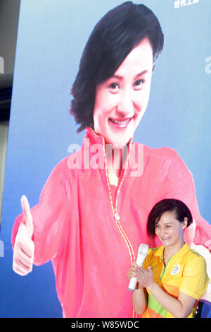 Former Chinese diver Gao Min, who won gold medals in the springboard event of the 1988 and 1992 Olympic Games, attends a signing event in Wuhan city, Stock Photo