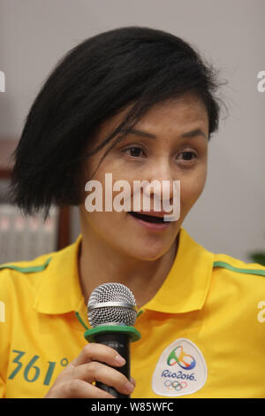 Former Chinese diver Gao Min, who won gold medals in the springboard event of the 1988 and 1992 Olympic Games, attends a signing event in Wuhan city, Stock Photo