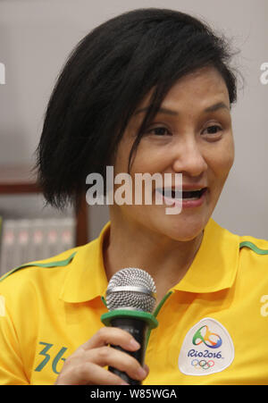 Former Chinese diver Gao Min, who won gold medals in the springboard event of the 1988 and 1992 Olympic Games, attends a signing event in Wuhan city, Stock Photo