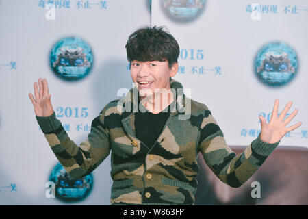 --FILE--Chinese actor Wang Baoqiang poses during an interview to promote his movie 'Impossible' in Beijing, China, 28 November 2015.   Dropping a bomb Stock Photo