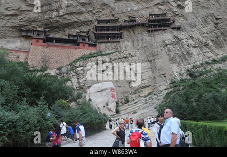 The Hanging Temple, also known as the Hanging Monastery or Xuankongsi, is seen on the cliff of a mountain near Mount Heng in Hunyuan county, Datong ci Stock Photo