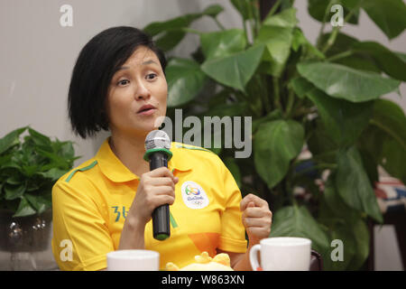 Former Chinese diver Gao Min, who won gold medals in the springboard event of the 1988 and 1992 Olympic Games, attends a signing event in Wuhan city, Stock Photo