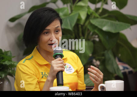 Former Chinese diver Gao Min, who won gold medals in the springboard event of the 1988 and 1992 Olympic Games, attends a signing event in Wuhan city, Stock Photo