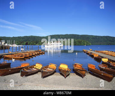 Cruise boat and rowing boats on Lake Windermere, Bowness-on-Windermere, Cumbria, England, United Kingdom Stock Photo