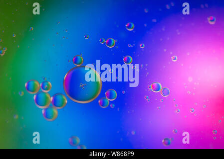Oil drops in water. Abstract psychedelic pattern image multicolored. Abstract background with colorful gradient colors. Stock Photo