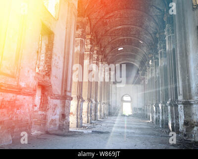 Burnt abandoned interior of an old catholic church in Ukraine, background for mystical kozharovaniya. Stock Photo