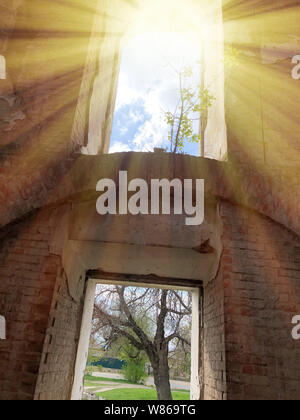 Burnt abandoned interior of an old catholic church in Ukraine, background for mystical kozharovaniya. Stock Photo