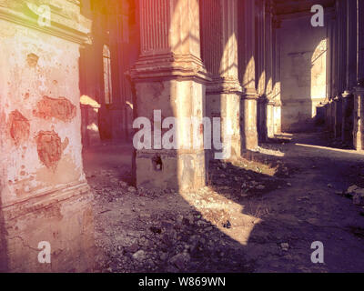 Burnt abandoned interior of an old catholic church in Ukraine, background for mystical kozharovaniya. Stock Photo