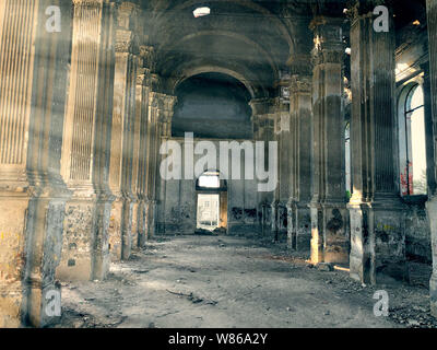 Burnt abandoned interior of an old catholic church in Ukraine, background for mystical kozharovaniya. Stock Photo