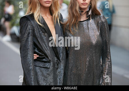 MILAN - JUNE 15: Woman with Da Vinci Louis Vuitton bag with Mona Lisa  before Alberta Ferretti fashion show, Milan Fashion Week street style on  June 15 Stock Photo - Alamy