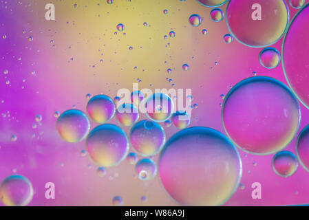 Oil drops in water. Abstract psychedelic pattern image multicolored. Abstract background with colorful gradient colors. Stock Photo