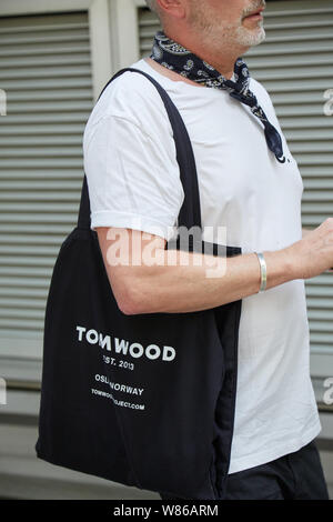 MILAN, ITALY - JUNE 15, 2019: Man with Vacheron Constantin watch and black  leather Hermes bag before Emporio Armani fashion show, Milan Fashion Week s  Stock Photo - Alamy