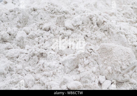Dirty snow on the road tile. winter time Stock Photo