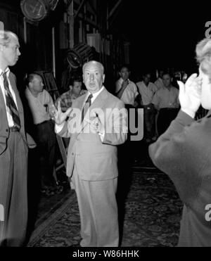 JAMES STEWART , ALFRED HITCHCOCK and DORIS DAY in THE MAN WHO KNEW TOO MUCH (1956), directed by ALFRED HITCHCOCK. Credit: PARAMOUNT PICTURES / Album Stock Photo