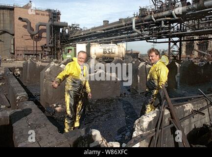 01 January 1992, Berlin, Lauchhammer: Federal States / Brandenburg / GDR / Industry 1992 End of the GDR. The large coking plant Lauchhammer is torn down. That's where they made coke out of brown coal. The photo symbolizes the dismantling of the GDR economy, environmental damage is being repaired, tar residues and all conceivable olefine pollutants must be removed. // Treuhand / Demolition / Economy / Environment During the Cold War, the GDR could not get coke for its steelworks from the West. She had to make it from lignite. The coking plant was supplied by 7 open pit lignite mines. After the Stock Photo