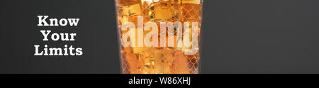 Whisky background - malt whisky on rocks isolated on dark backdrop Stock Photo