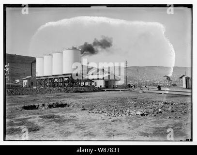 Shell oil tanks near Haifa. Other smaller tanks in Shell Co. yard. Stock Photo