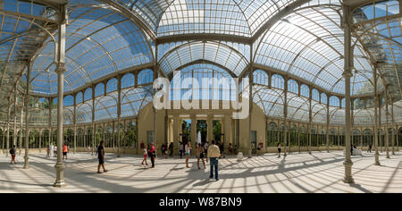 Horizontal panoramic of the Palacio de Cristal at Retiro Park in Madrid. Stock Photo