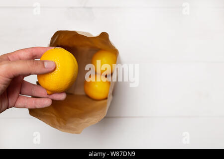 Brown paper bag from top view looking down inside at bottom. Stock Photo