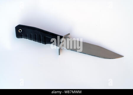 Black Army knife on a white background. knife close-up. Stock Photo