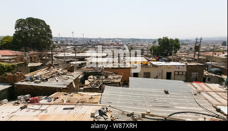 Johannesburg, South Africa - August 29 2013: High Angle rooftop view of low income houses in Alexandra township Johannesburg South Africa Stock Photo