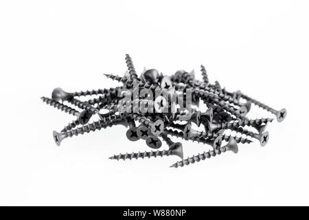 Screws still life large self tapping screws on white background. Stock Photo