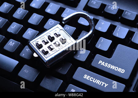 Security lock on black computer keyboard Stock Photo