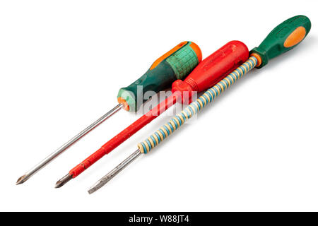 Very old screwdriver on a white background, isolate. Stock Photo