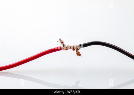 Twist the two wires on the light-house background Stock Photo