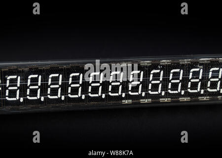 very old digital indicator close up on a black background not isolate Stock Photo