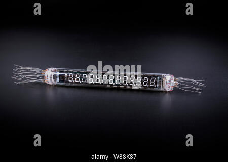 very old digital indicator on a black background not isolate Stock Photo