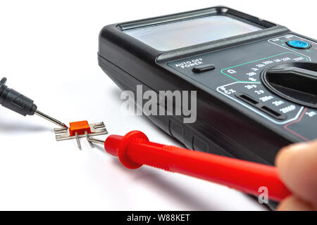 Test transistor using a portable universal electronic device Stock Photo