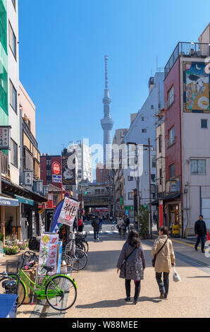 Shops and restaurants in Asakusa looking towards the Tokyo Skytree, Taito,Tokyo, Japan Stock Photo