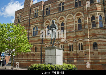 Statue of William Webb Ellis outside Rugby School,  Rugby, Warwickshire sculpted by Graham Ibbeson, Stock Photo