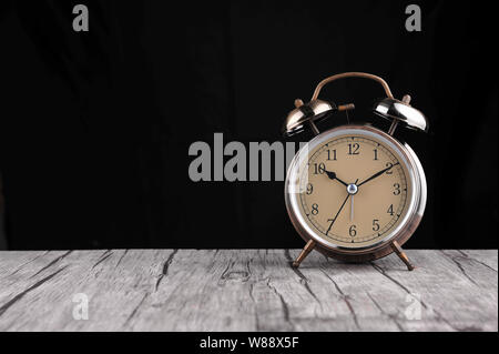 Alarm clock isolated on a black background Stock Photo