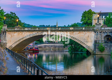 VIew of an historic bridge during dusk in Bath Stock Photo