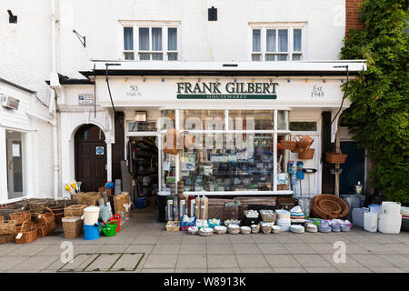 Market Harborough, Leicestershire, UK: Traditional style hardware shop. A wide range of goods are visible in the window and on the pavement outside. Stock Photo