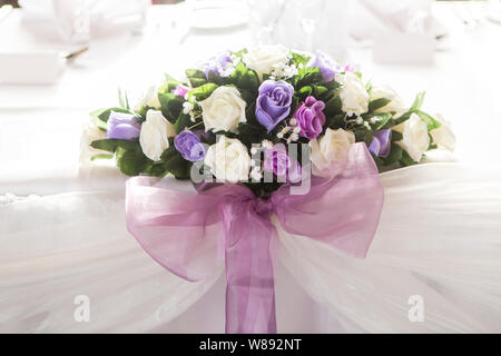 White & Purple Floral Table Decorations Stock Photo