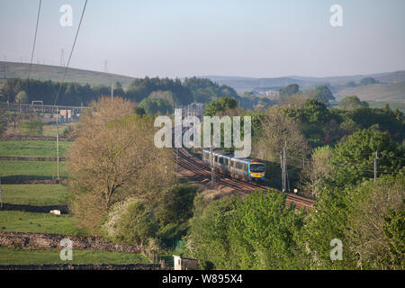 First Transpennine Express class 185 train passing Shap on the west coast mainline with a Manchester to Glasgow train Stock Photo