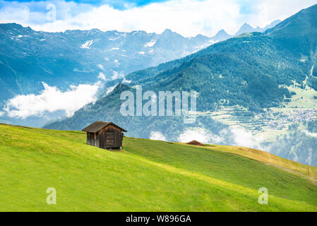 Little Shed On Pasture Field In Mountains In Austria Stock Photo