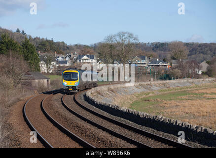 Transpennine Express class 185 passing Cart Lane, Grange Over sands on the Cumbrian coast railway line while on hire to Arriva Northern rail Stock Photo
