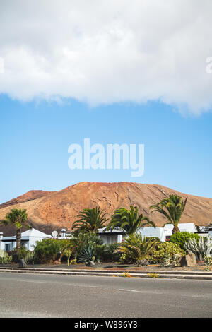 Desert atmosphere in the streets of Lanzarote at the foot of volcanoes - Travel landscape Stock Photo