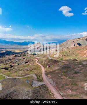 Aerial view of dirt roads on the plateau around Mount Ararat, dirt roads and breathtaking landscapes, winding roads, rocky peaks and hills. Turkey Stock Photo