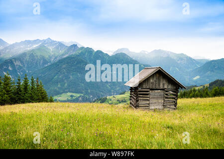 Little Shed On Pasture Field In Mountains In Austria Stock Photo
