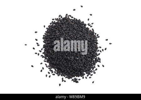 Top view of scattered black sesame seeds isolated on white Stock Photo
