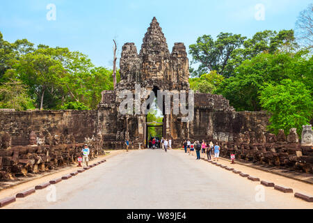 SIEM REAP, CAMBODIA - MARCH 23, 2018: Entrance gate of Bayon Temple. Bayon is a well known khmer temple at Angkor in Cambodia. Stock Photo