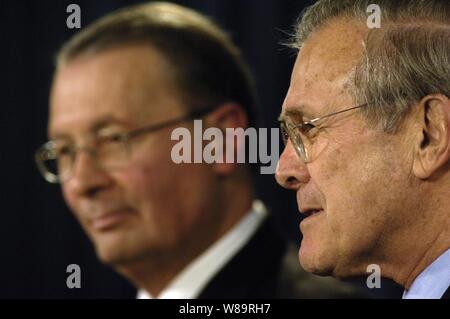 Secretary of Defense Donald H. Rumsfeld (right) and Vice Chairman of the Joint Chiefs of Staff Admiral Edmund Giambastiani, U.S. Navy, answer questions during a Pentagon press briefing in Arlington, Va., on Feb. 1, 2006.  Rumsfeld and Giambastiani talked to reporters about the pending Quadrennial Defense Review and the continued Global War on Terrorism. Stock Photo